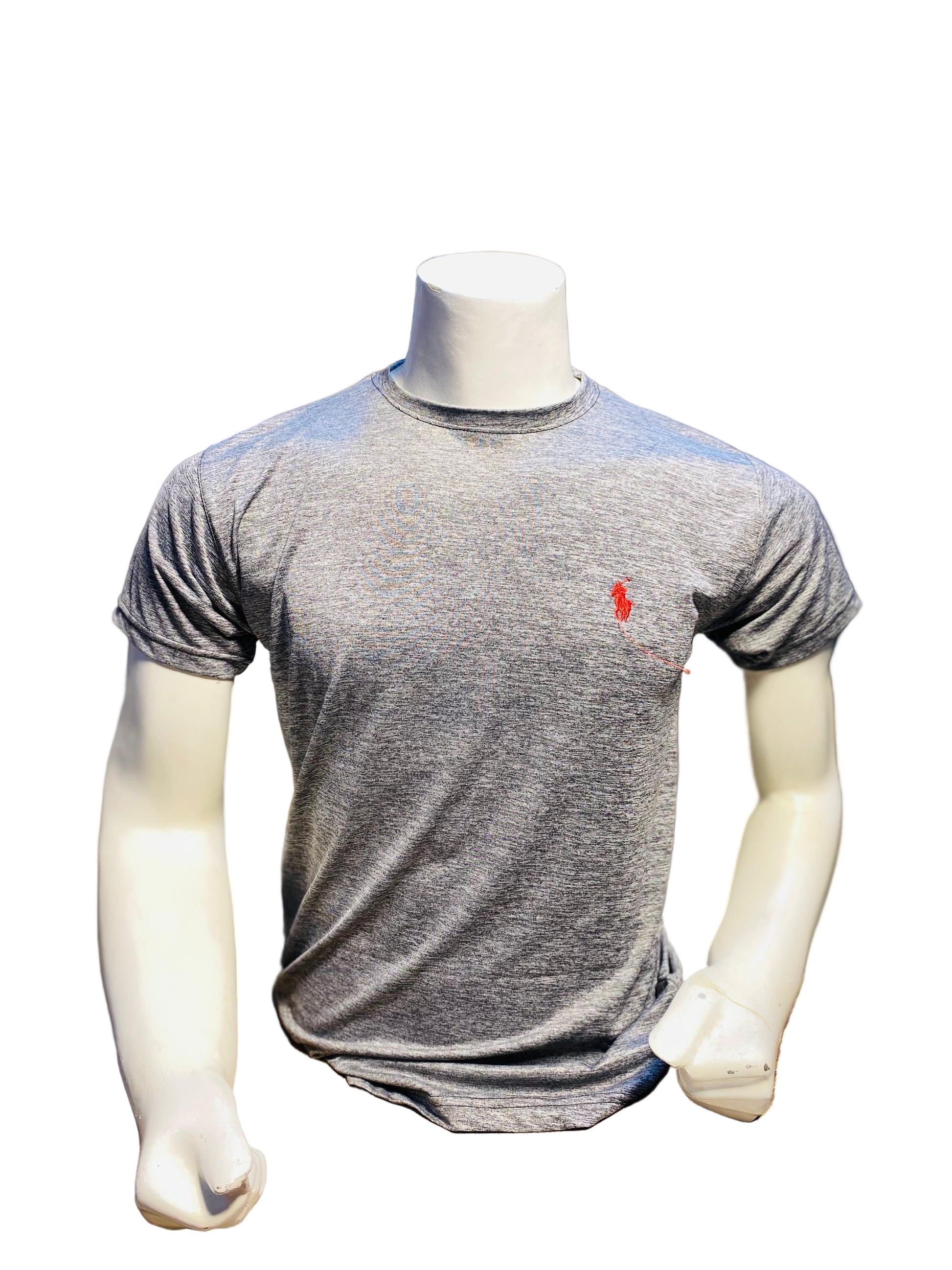 Gray t-shirt with a red logo on a mannequin in a store setting